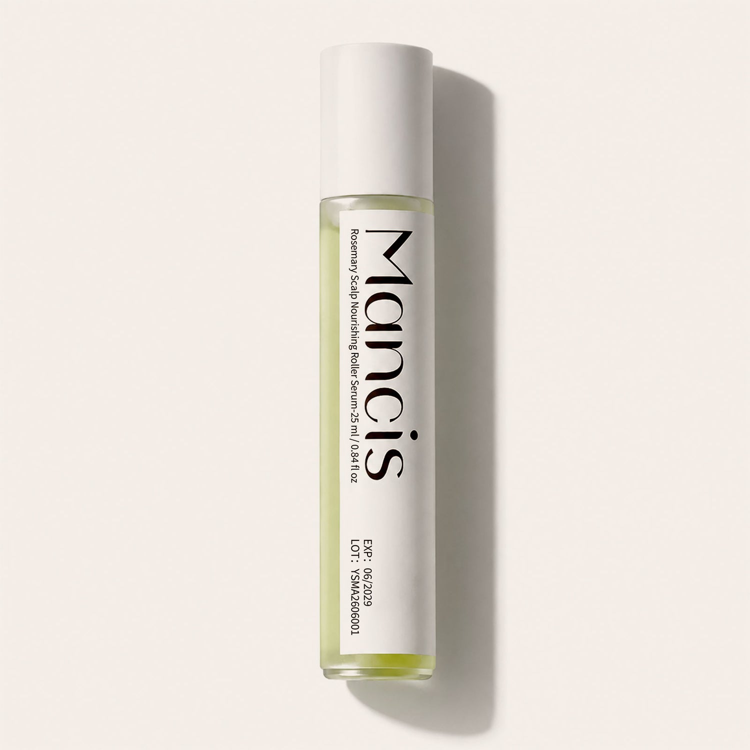 Rosemary Leave-In Scalp Roller Serum bottle on a light background