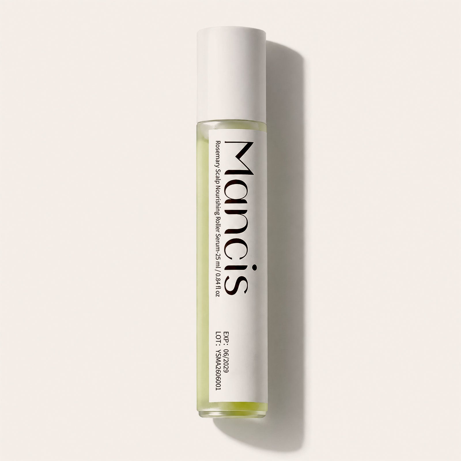 Rosemary Leave-In Scalp Roller Serum bottle on a light background