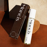 Rosemary Leave-In Scalp Roller Serum bottle beside its black product box