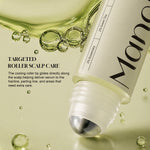 Close-up of the roller applicator on the Rosemary Leave-In Scalp Roller Serum bottle